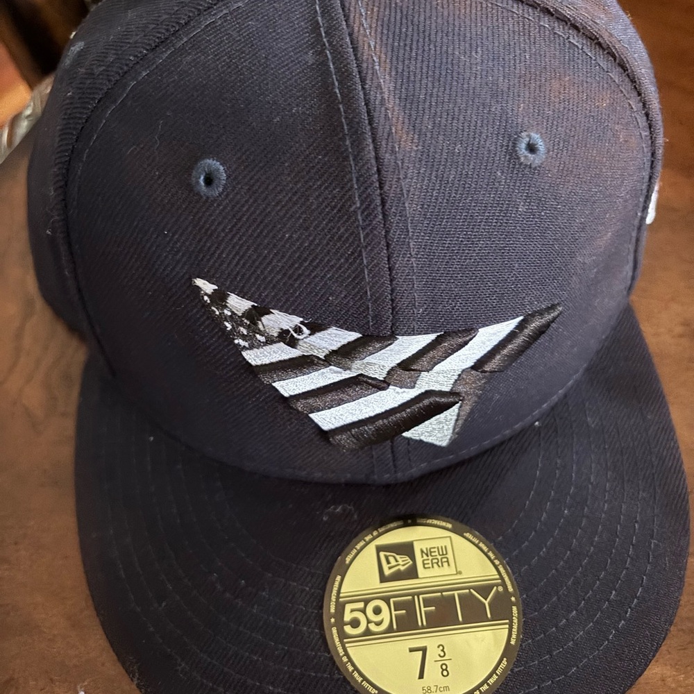 New Era Black Fitted Hat with Silver Wing Logo